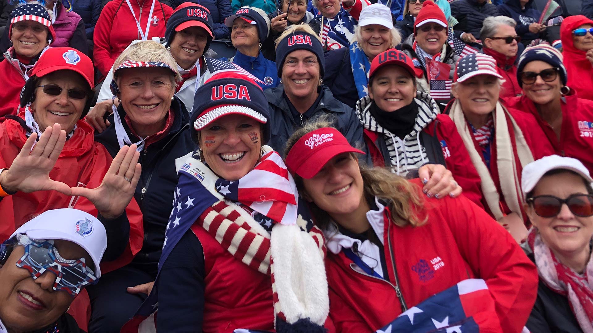 USA-clad golf fans cheer on the USA Team at the Solheim Cup
